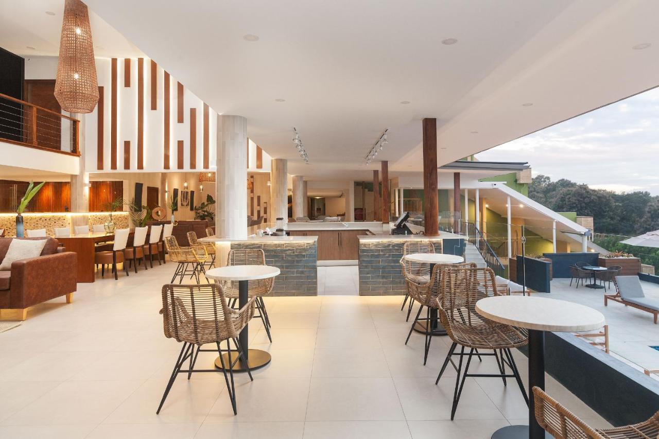 Cara Hotels Trinidad Claxton Bay Bagian luar foto